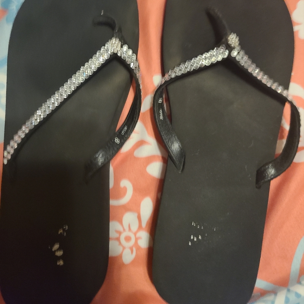 Black yellowbox flip flops